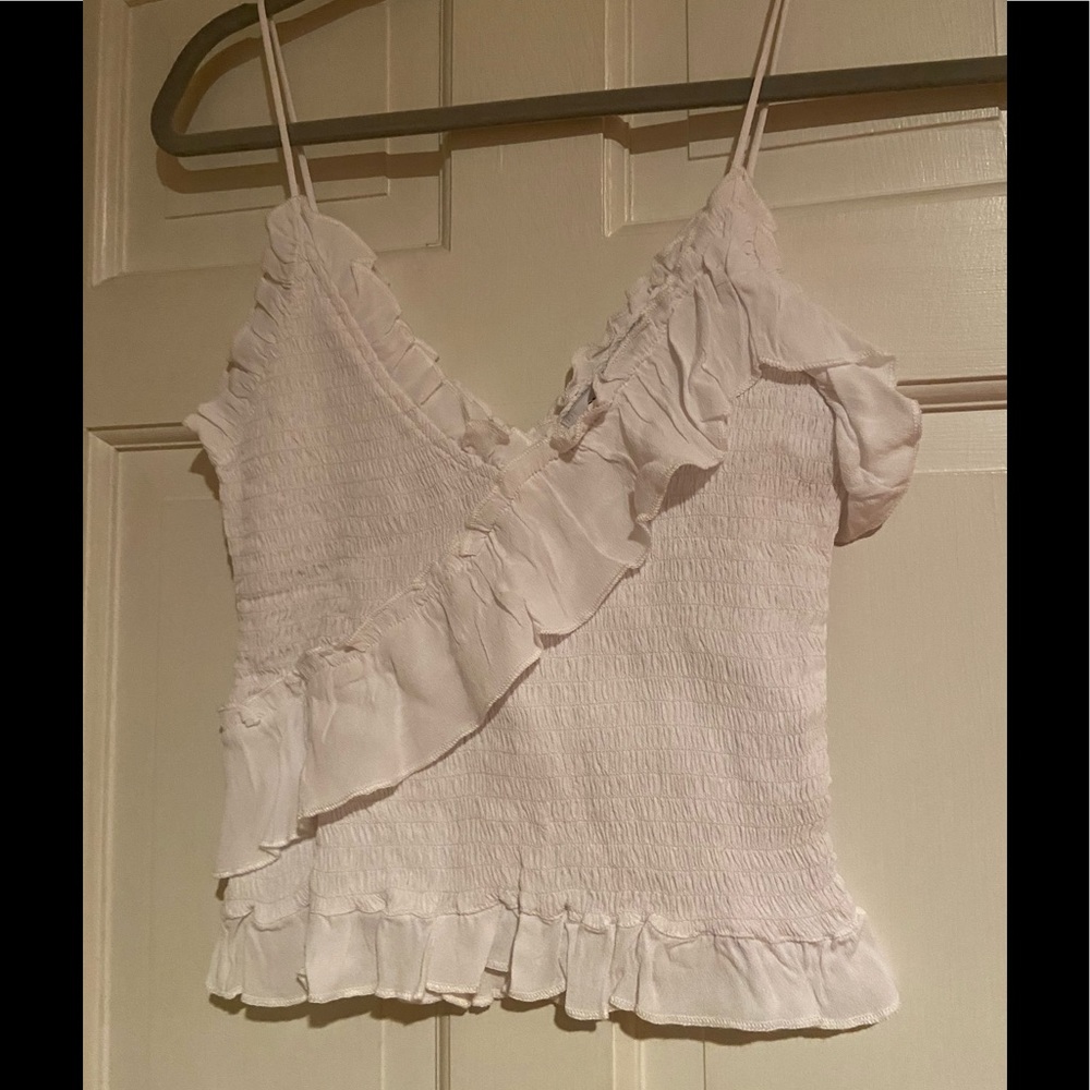 Olivaceaus white ruffle tank